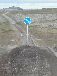 "Keep right" sign on a dirt road on the Snæfellsnes peninsula of Iceland. Photo by Brian Lucas.